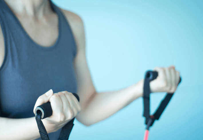 Woman Exercising Resistance Bands