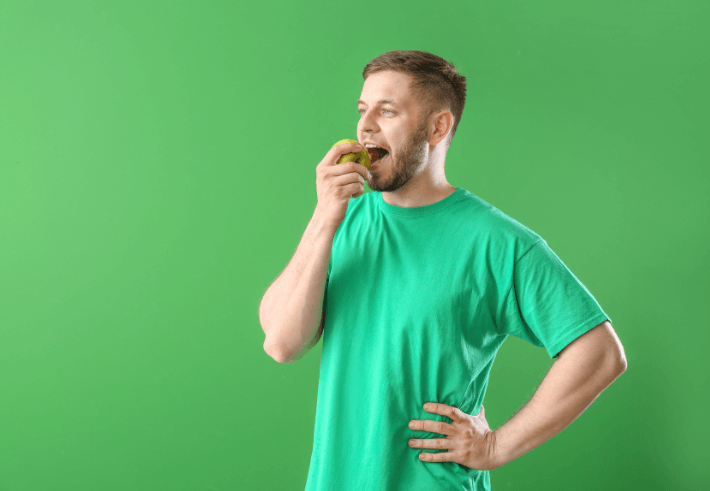 Man Eating Apple