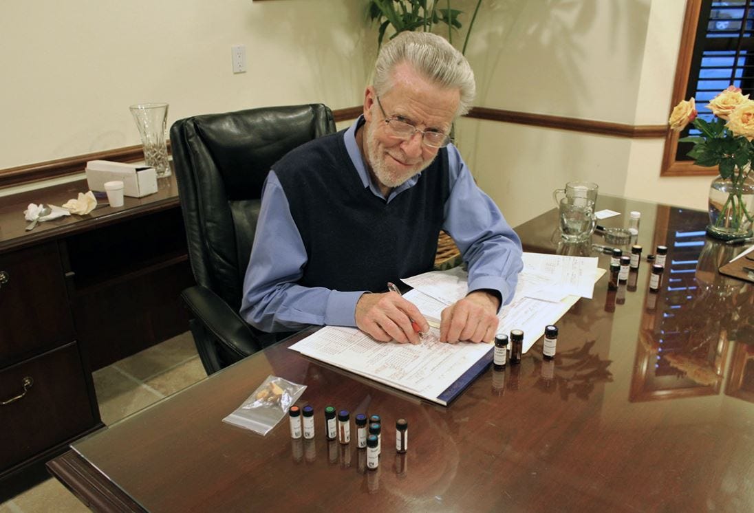 Dr. Bob Marshall working at his desk